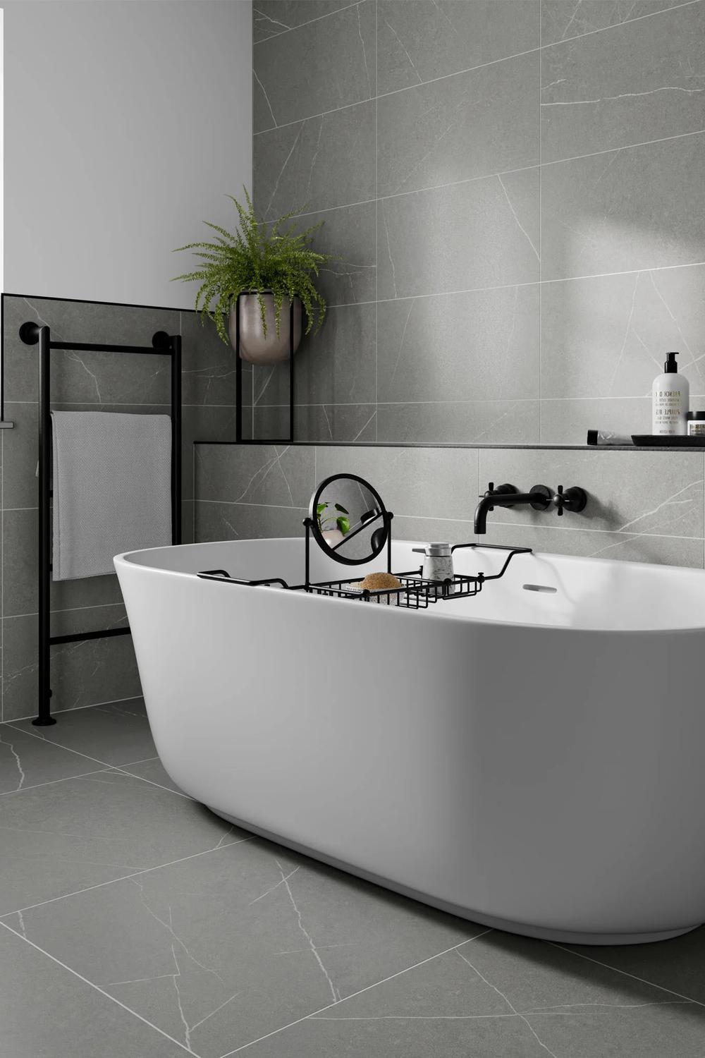 Natural elements and plants enhance the tranquility of a modern grey bathroom