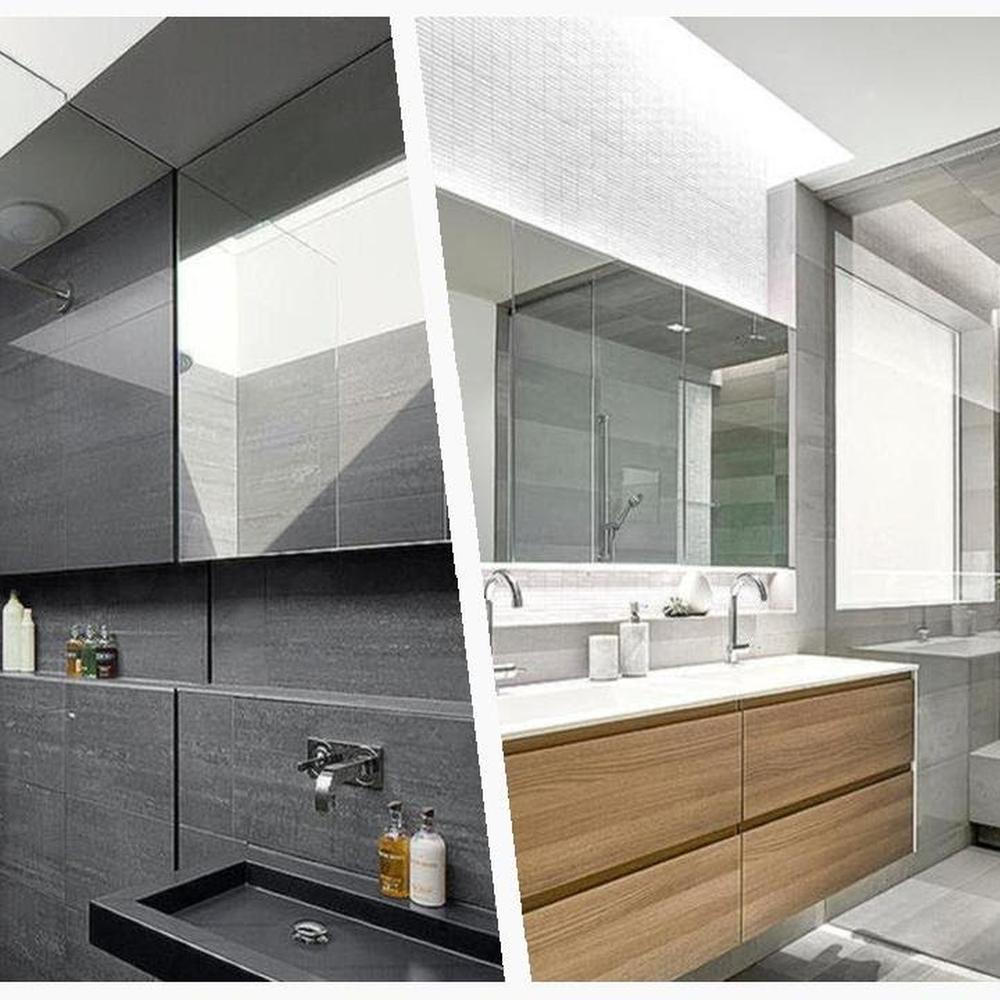 Elegant wall decor enhances the aesthetic of a grey tile bathroom
