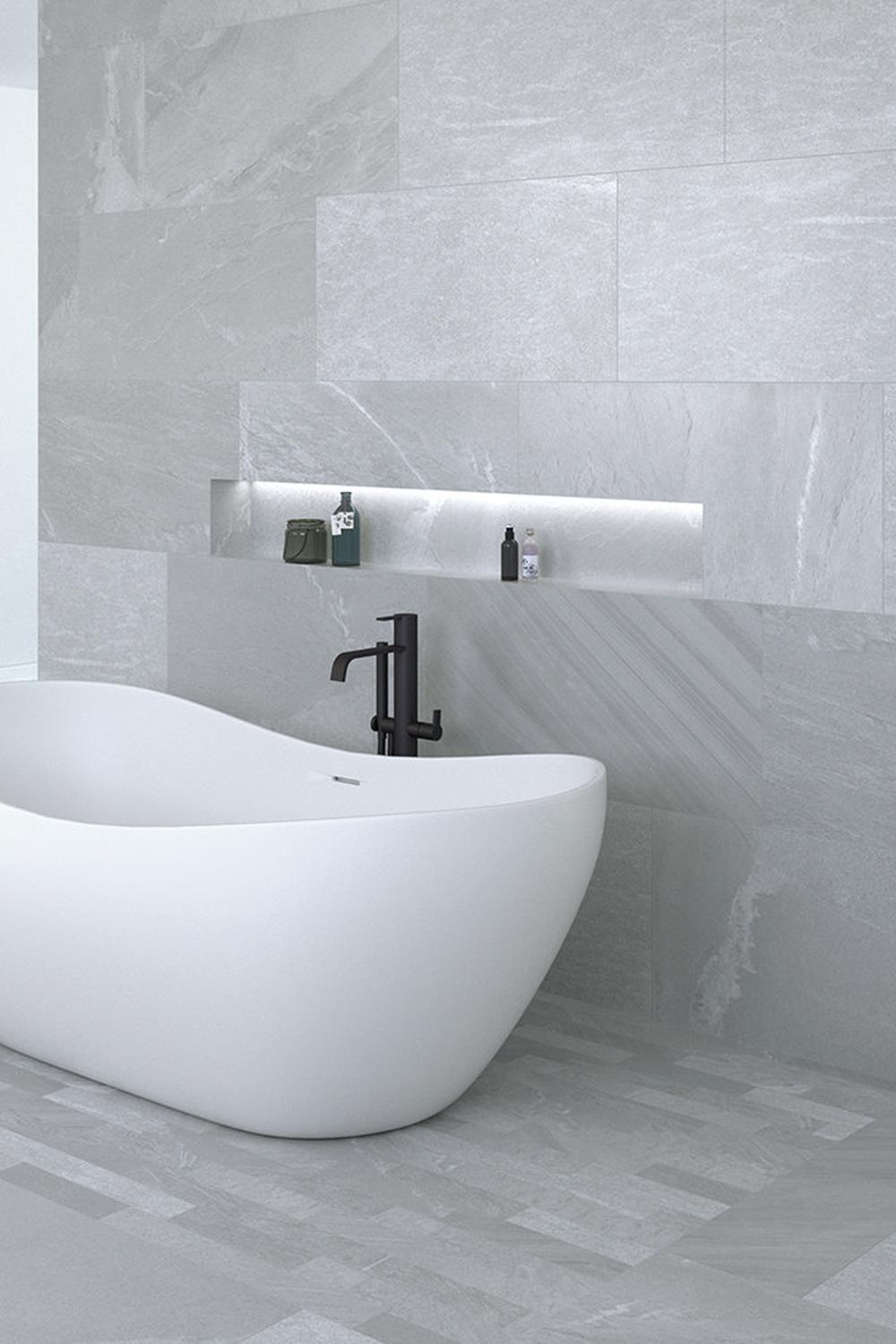 Clever storage solutions enhance organization in a modern grey bathroom