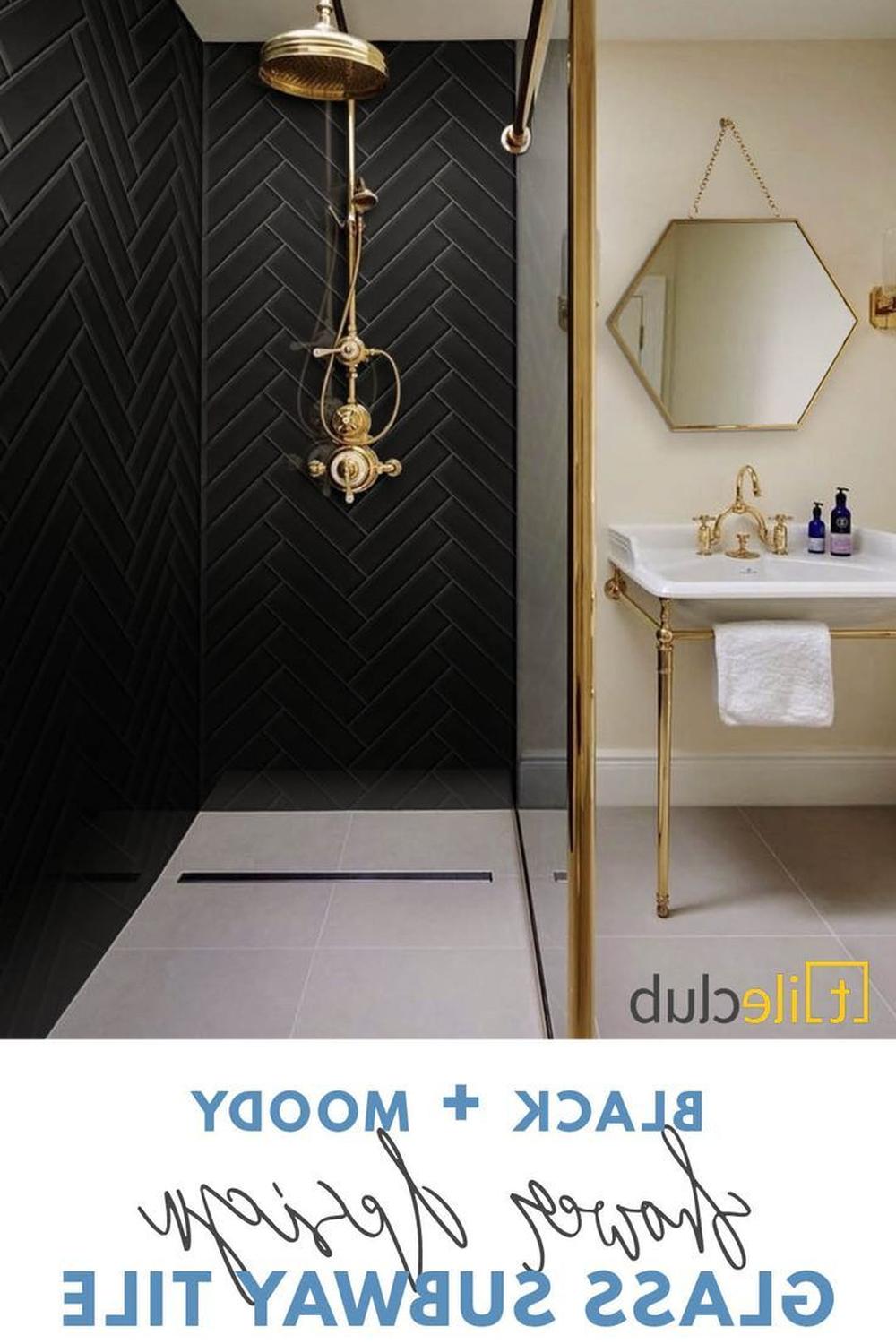 Stylish shower area featuring herringbone black tile wall.