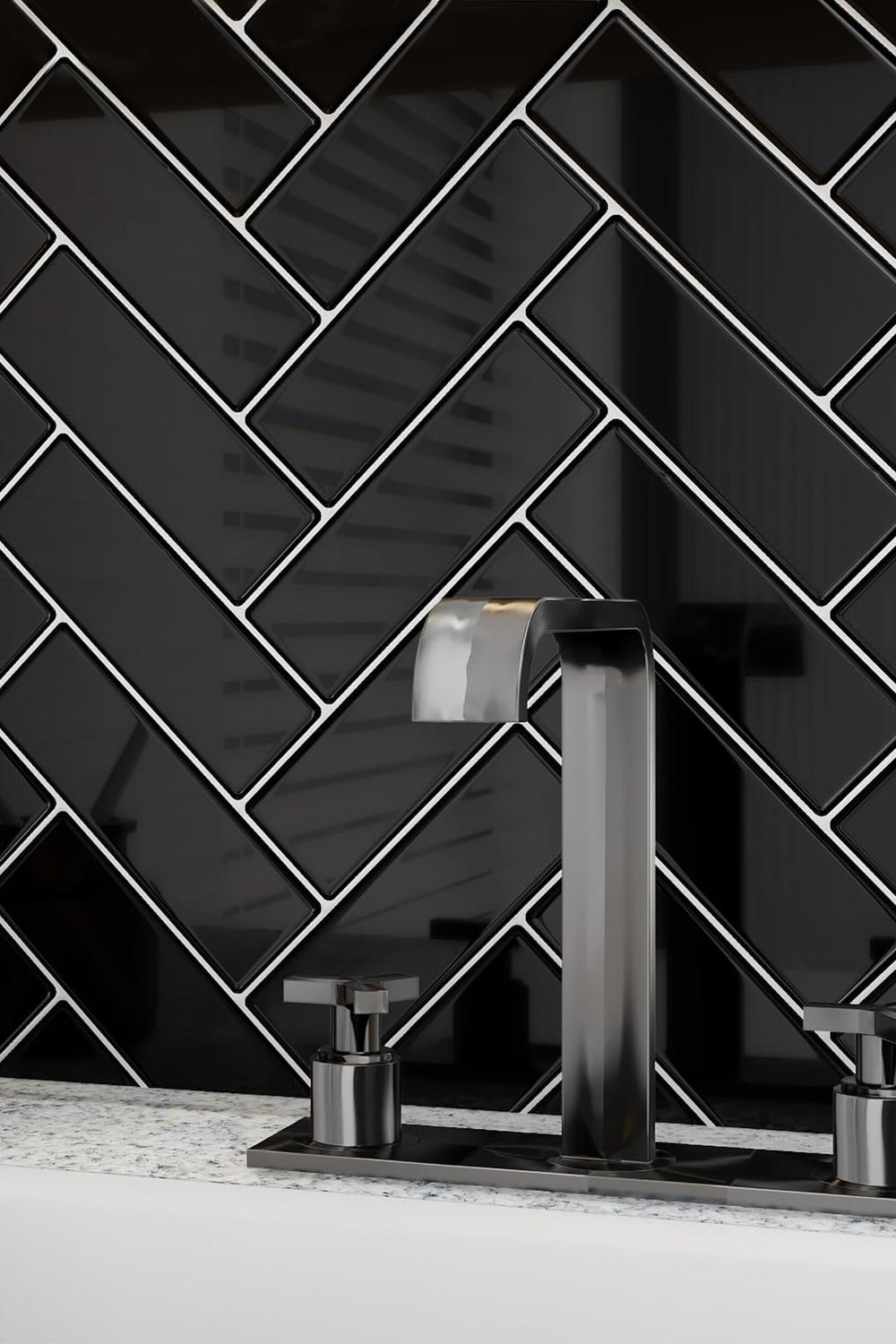 Stylish modern bathroom with herringbone black tile design.
