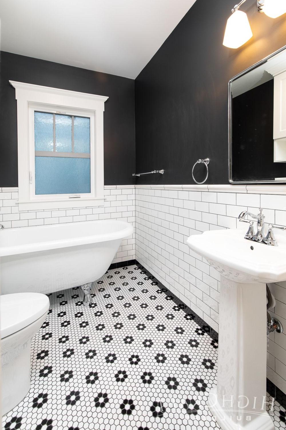Elegant bathroom featuring a classic black and white hexagon tile floor.