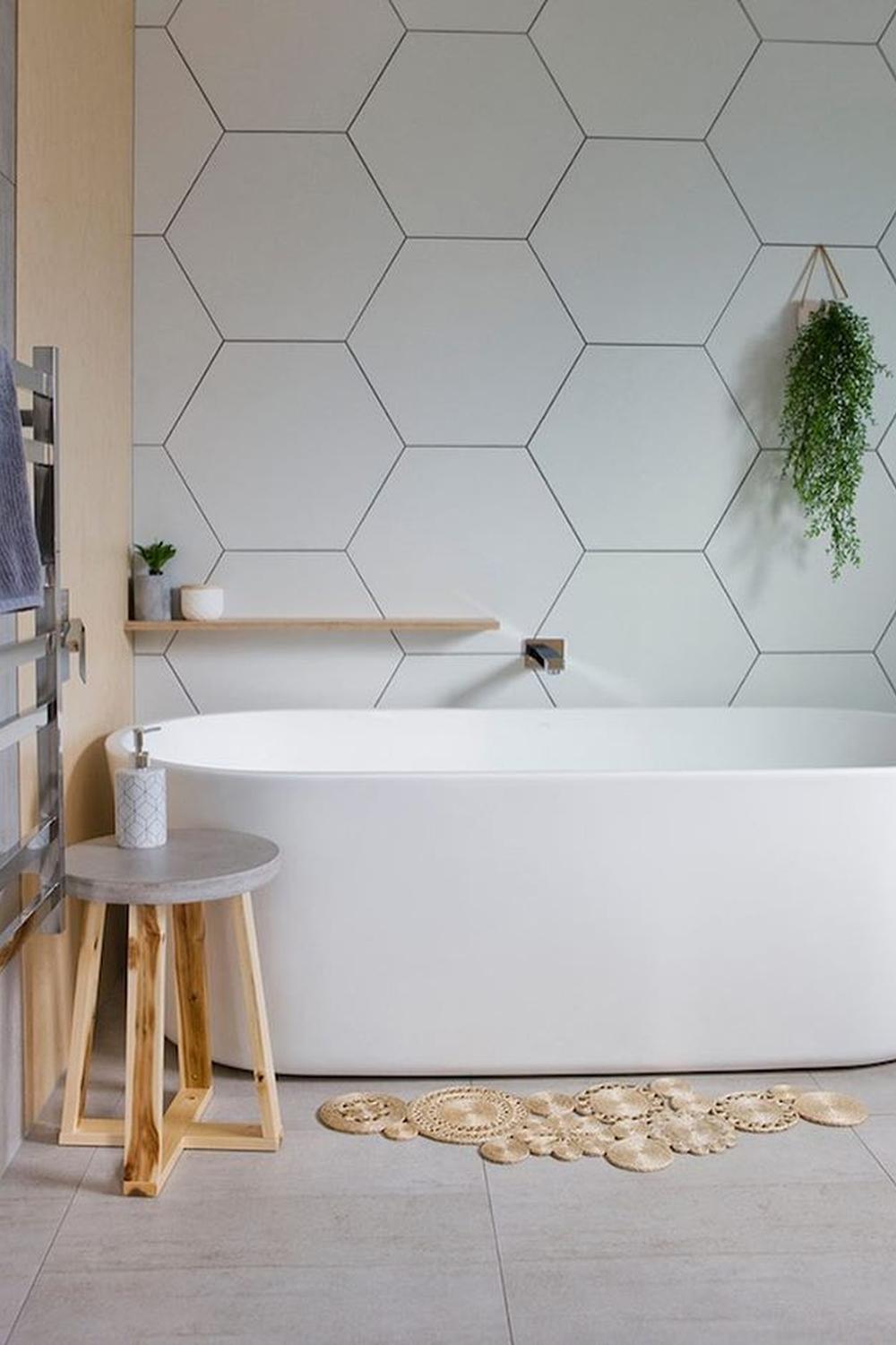 Cozy bathroom with soft white hexagon tile design