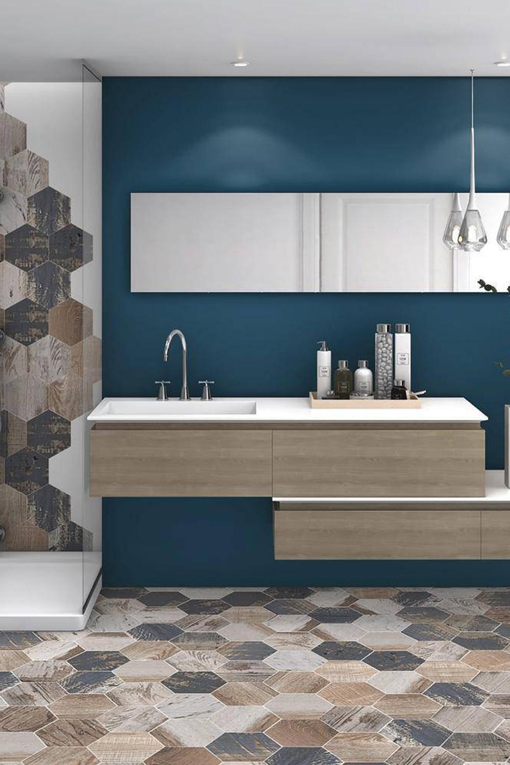 Bathroom with rustic charm featuring hexagon tiles and dark accents