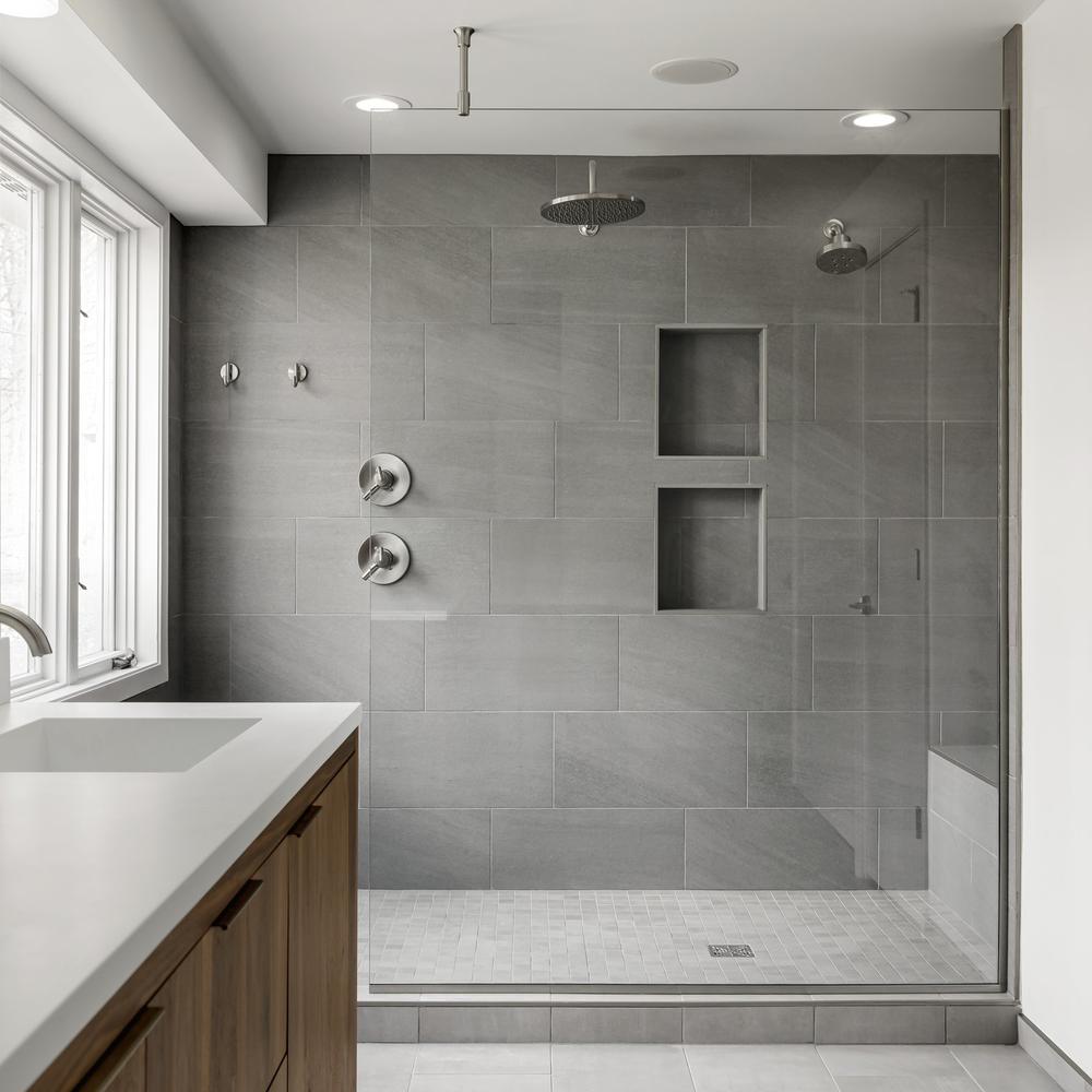Modern bathroom with textured backsplash and stylish decor