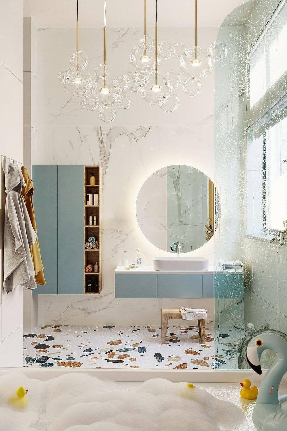 A contemporary kids' bathroom filled with playful elements like colored terrazzo floors and quirky decor.