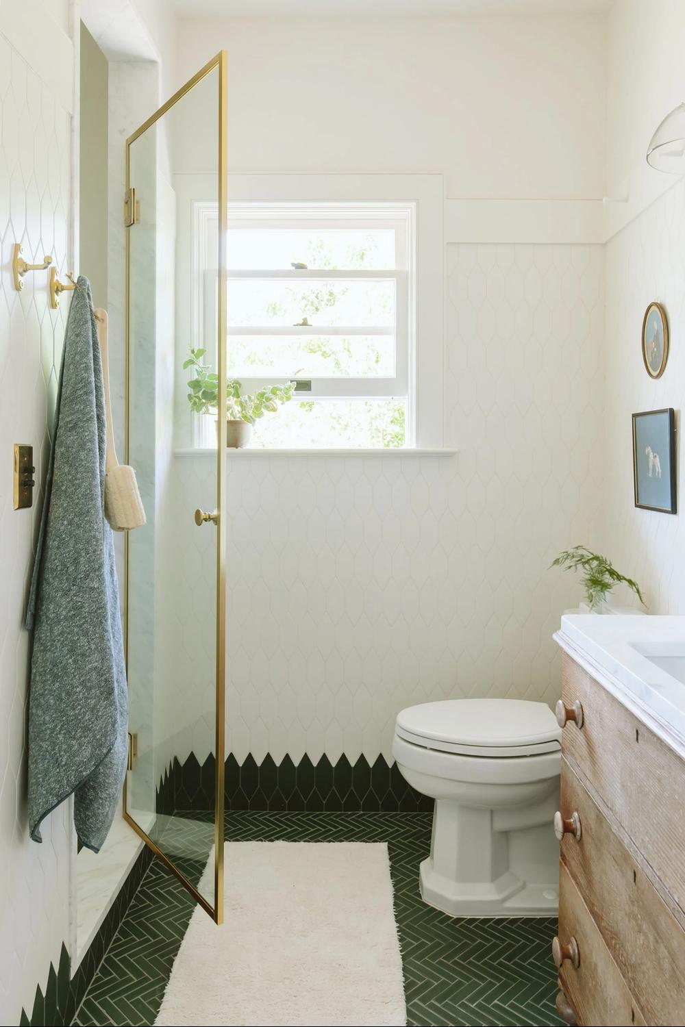 A calm and modern kids' bathroom with pastel touches, offering elegance and playfulness.