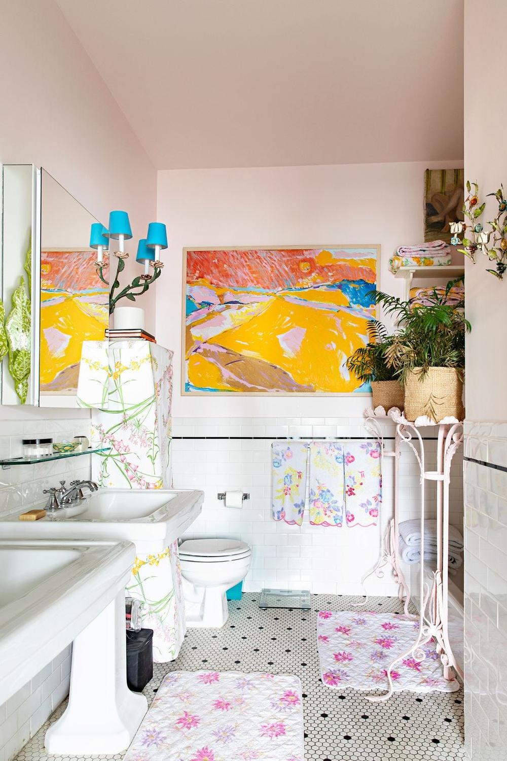A bright children's bathroom designed to be cheerful and inviting with playful artwork and decor.