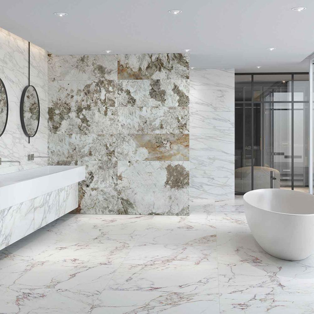 Artistic bathroom with large-format tiles and a unique bathtub design