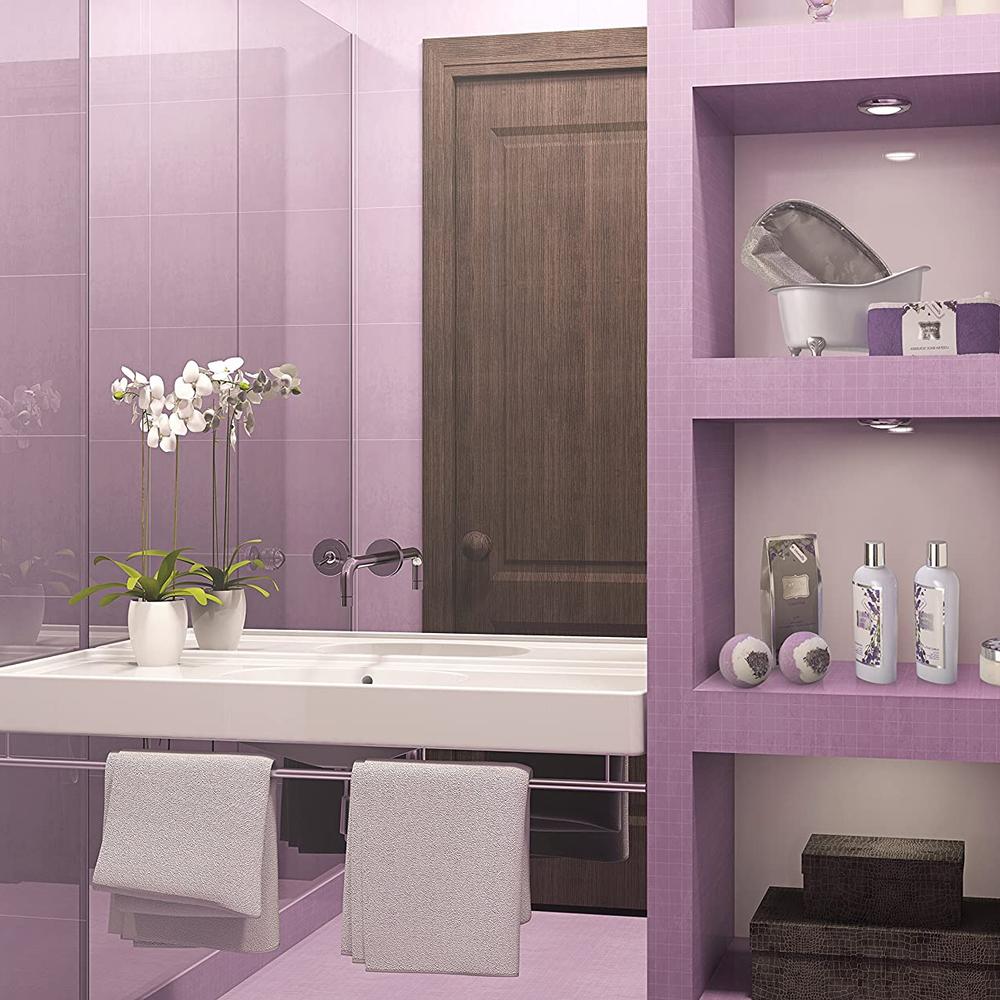 Thoughtfully designed bathroom showcasing lavender tones and open shelving.