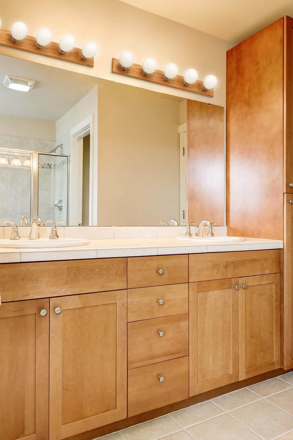 Light wood vanity with contemporary elements.