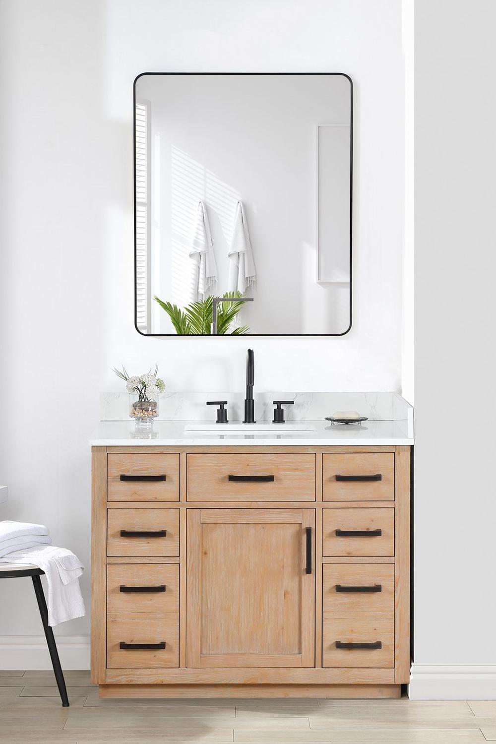 Light wood bathroom vanity with natural accents.