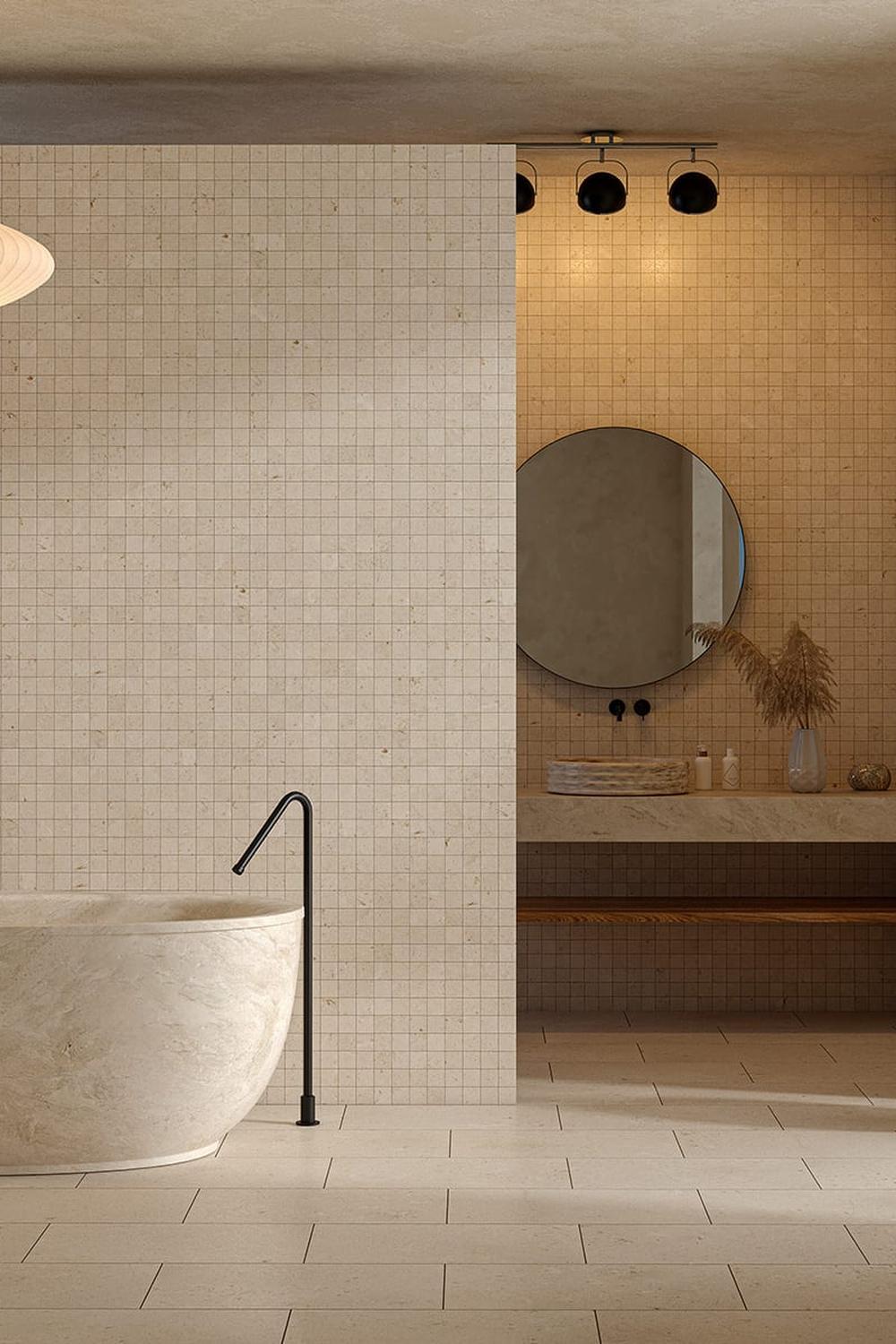 Baño con lavabos de piedra caliza y detalles elegantes