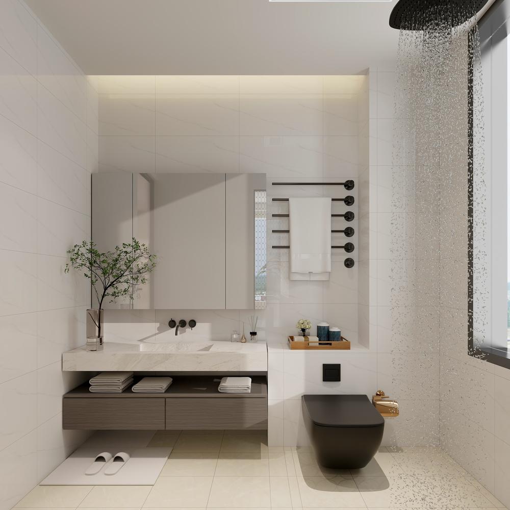 Baño sobrio y elegante, lavabo en tonos claros y detalles oscuros