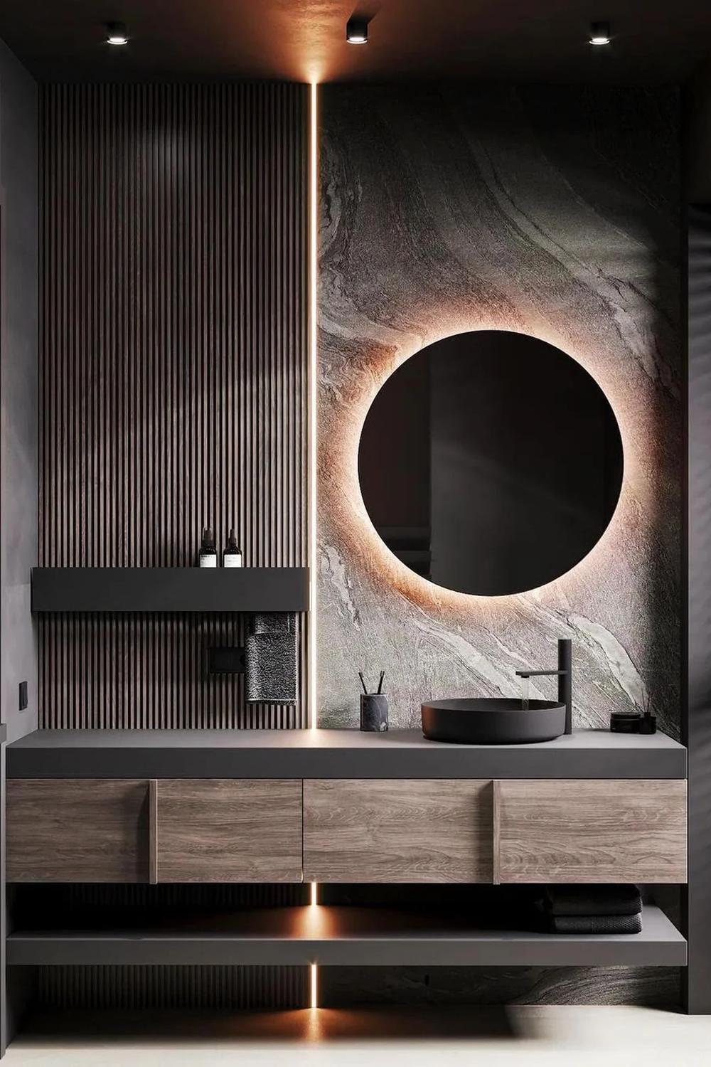 A rustic modern masculine bathroom with stone walls and wood finishes.