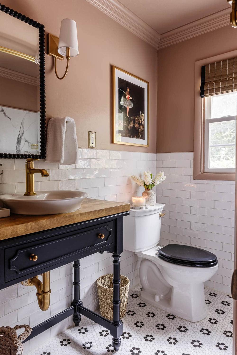 Vintage charm in mauve bathroom with elegant accents and intricate design.