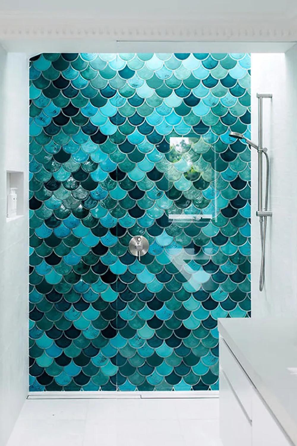 Striking bathroom with white and blue tile work creating a serene environment