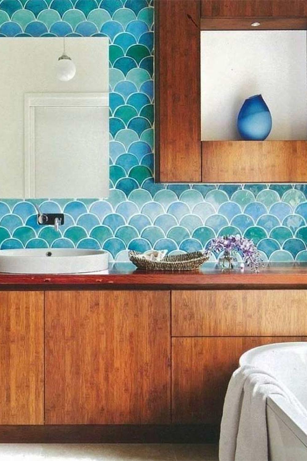 Beautifully designed bathroom showcasing a focal point of ocean-inspired tile