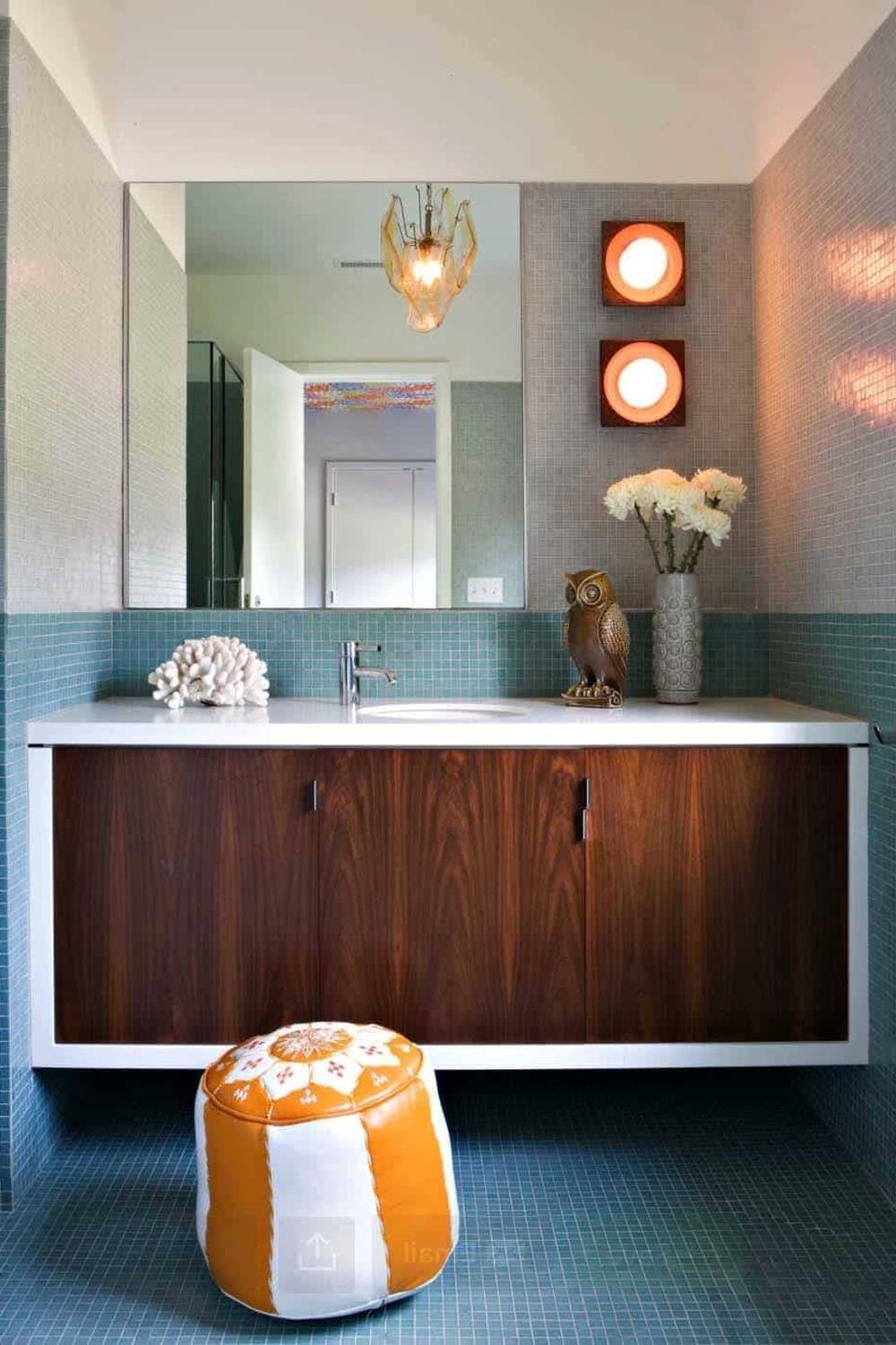 Baño Sofisticado con Tonos Suaves de Azul y Detalles Naturales