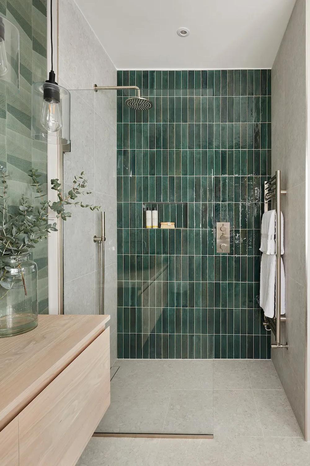 Contemporary bathroom showcasing a classic mint green tile shower area.