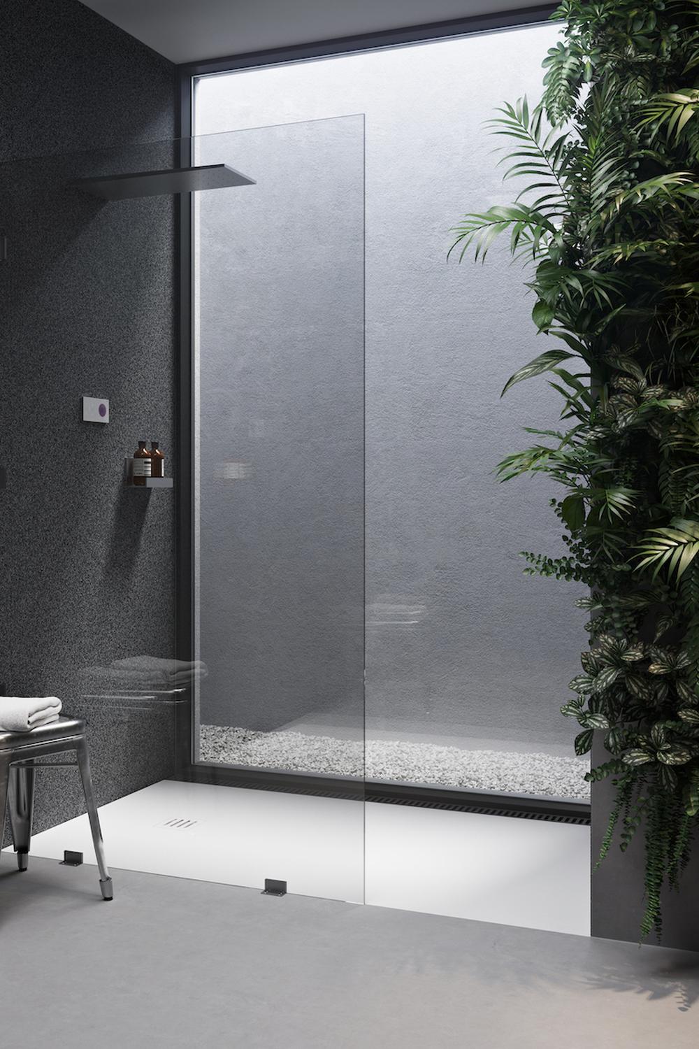 Baño tranquilo con ducha de cristal