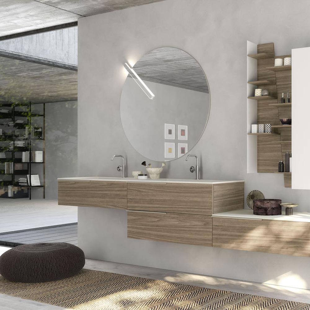 Sleek modern bathroom vanity with light wood finish and simple design