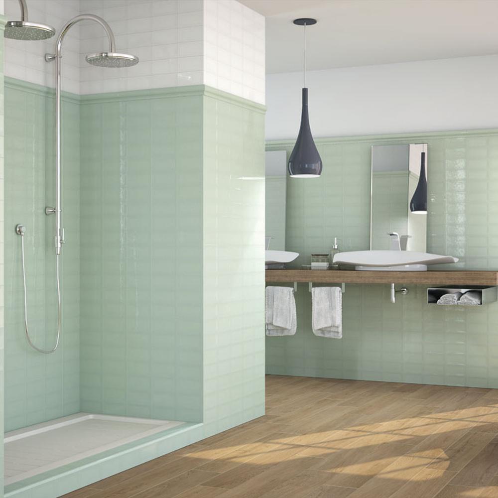 Modern bathroom featuring mint green features and vibrant accents