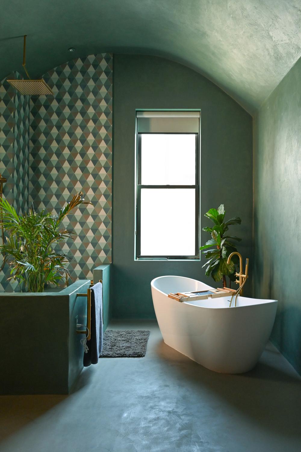 Tranquil Moroccan bathroom with soothing green hues and modern fixtures