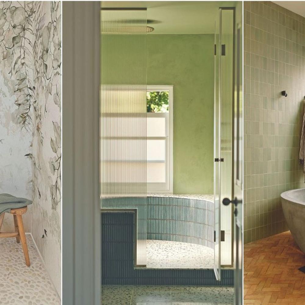 A nature-inspired bathroom with pebble flooring and botanical wallpaper