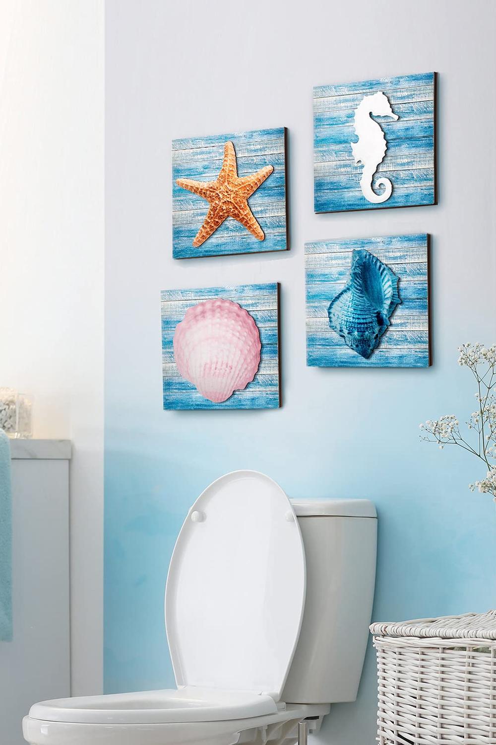 A charming bathroom adorned with ocean-themed artwork and a serene design.