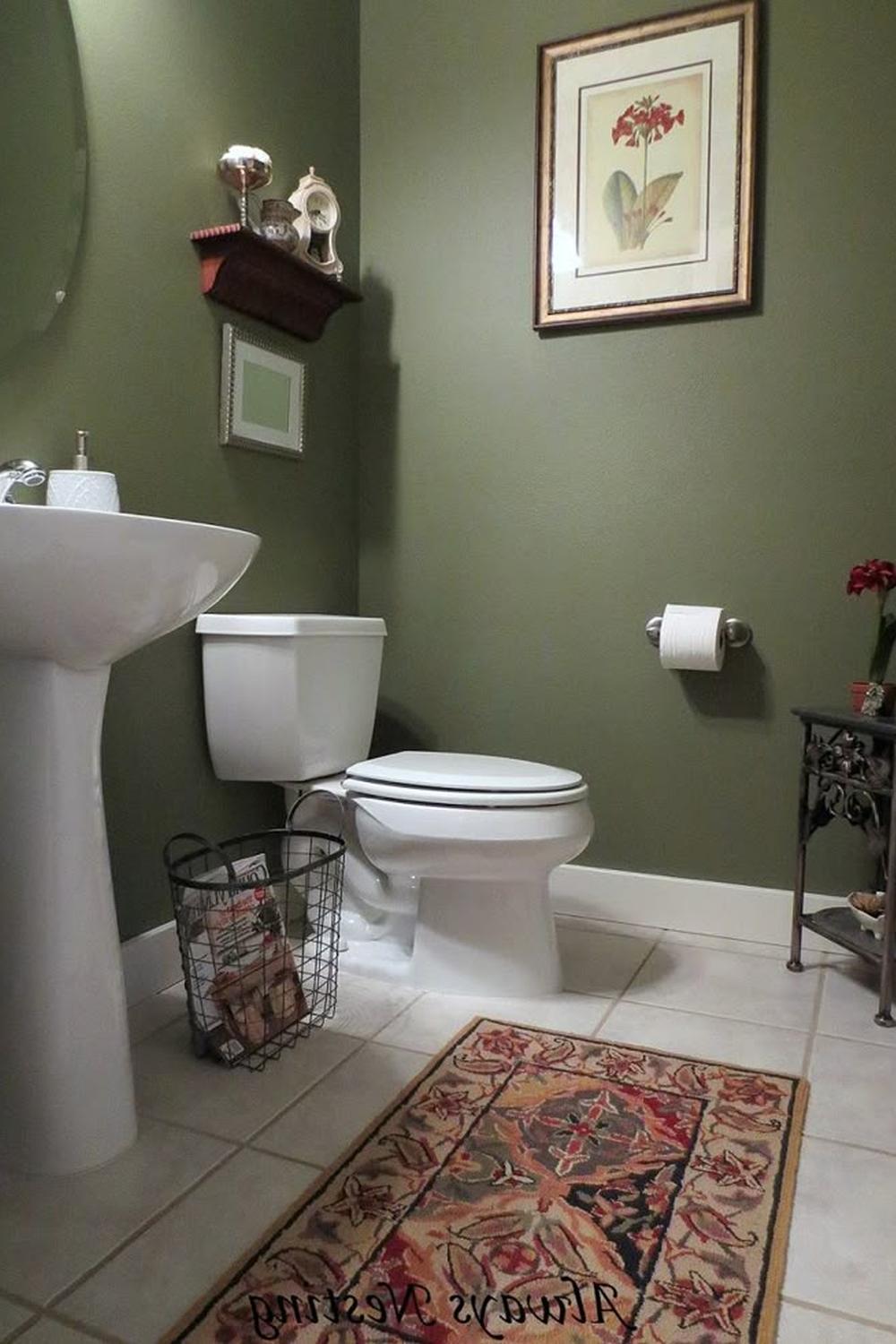 A stylish contrast of olive green and white in a bathroom setting.