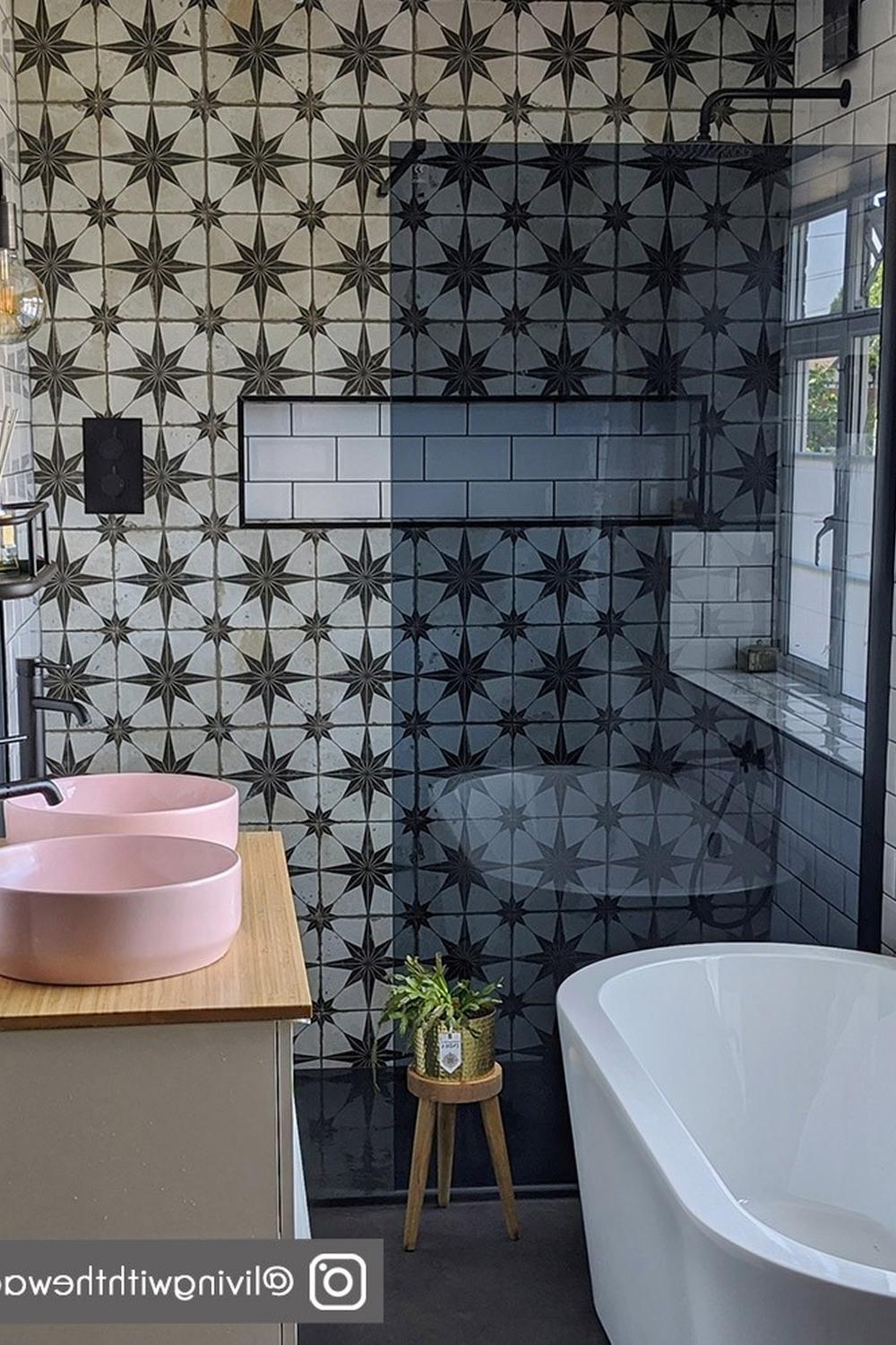 Geometric patterns create an elegant tile wall, enhancing the overall aesthetic.