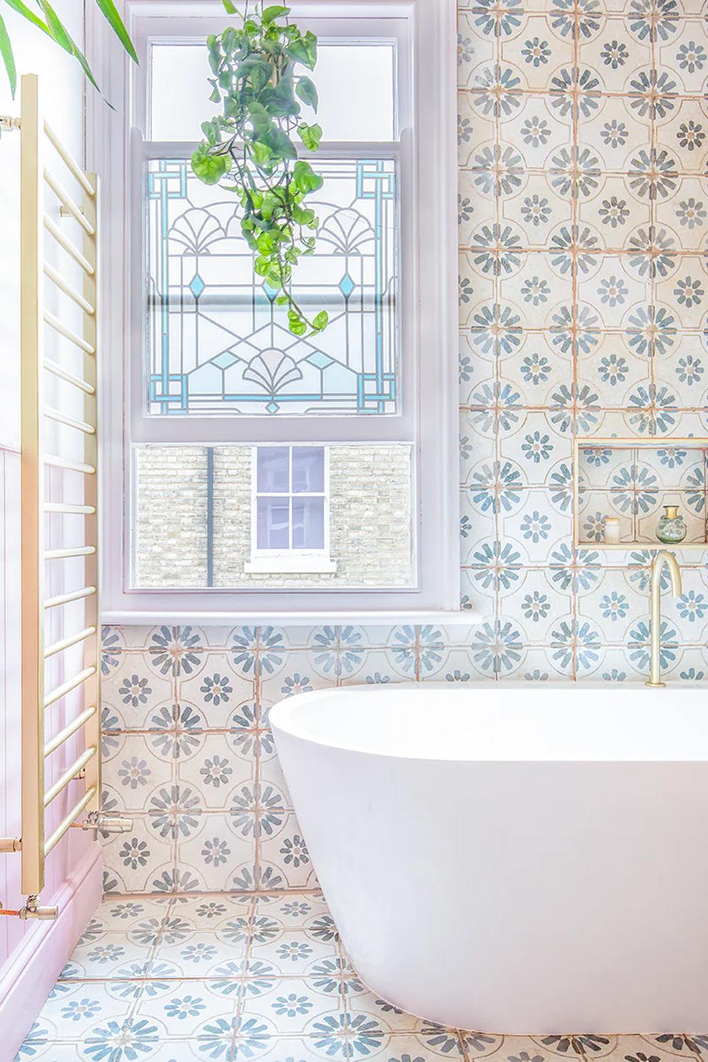 Vibrant patterns with soft color palettes create an inviting bathroom atmosphere.