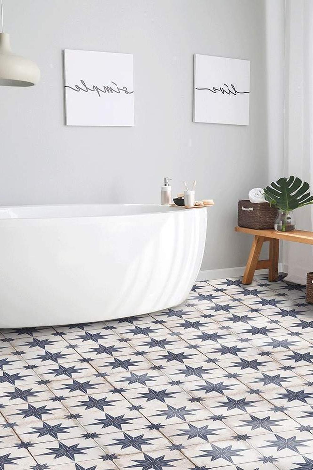 Vibrant geometric designs with minimalist touches enhance a stylish bathroom.