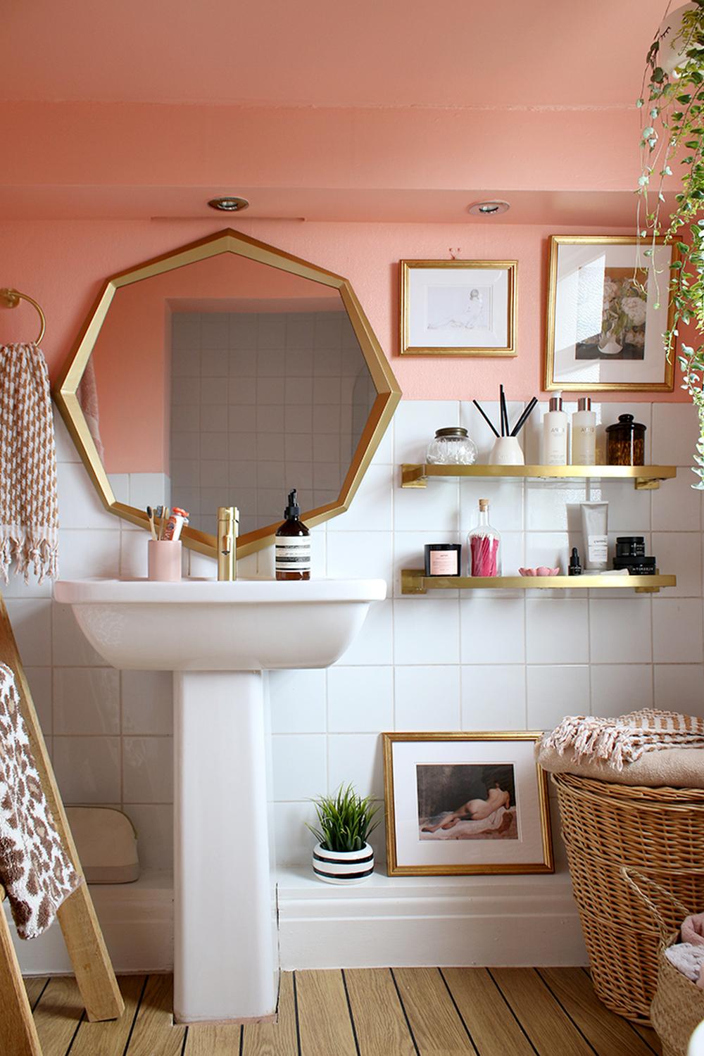 Stylish bathroom showcasing a peach theme and geometric decor