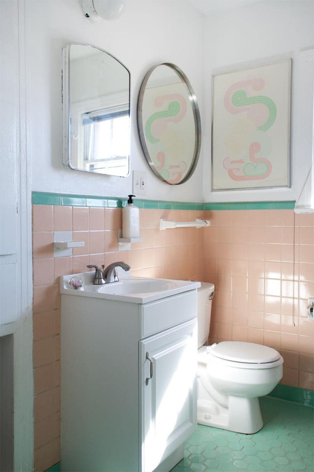 Inviting bathroom showcasing a blend of peach and mint green retro tiles