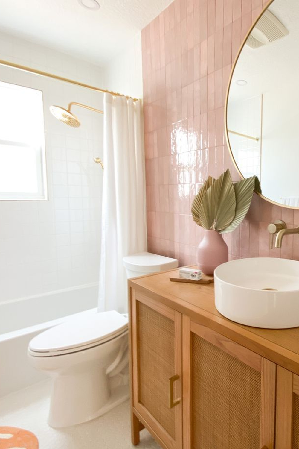 Stylish bathroom showcasing warm peach tiles with geometric patterns