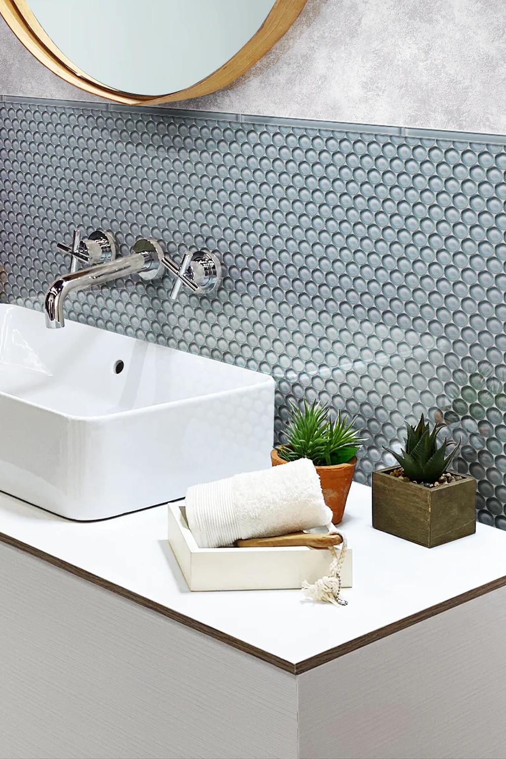 A stylish sink area showcasing reflective details and textured designs.