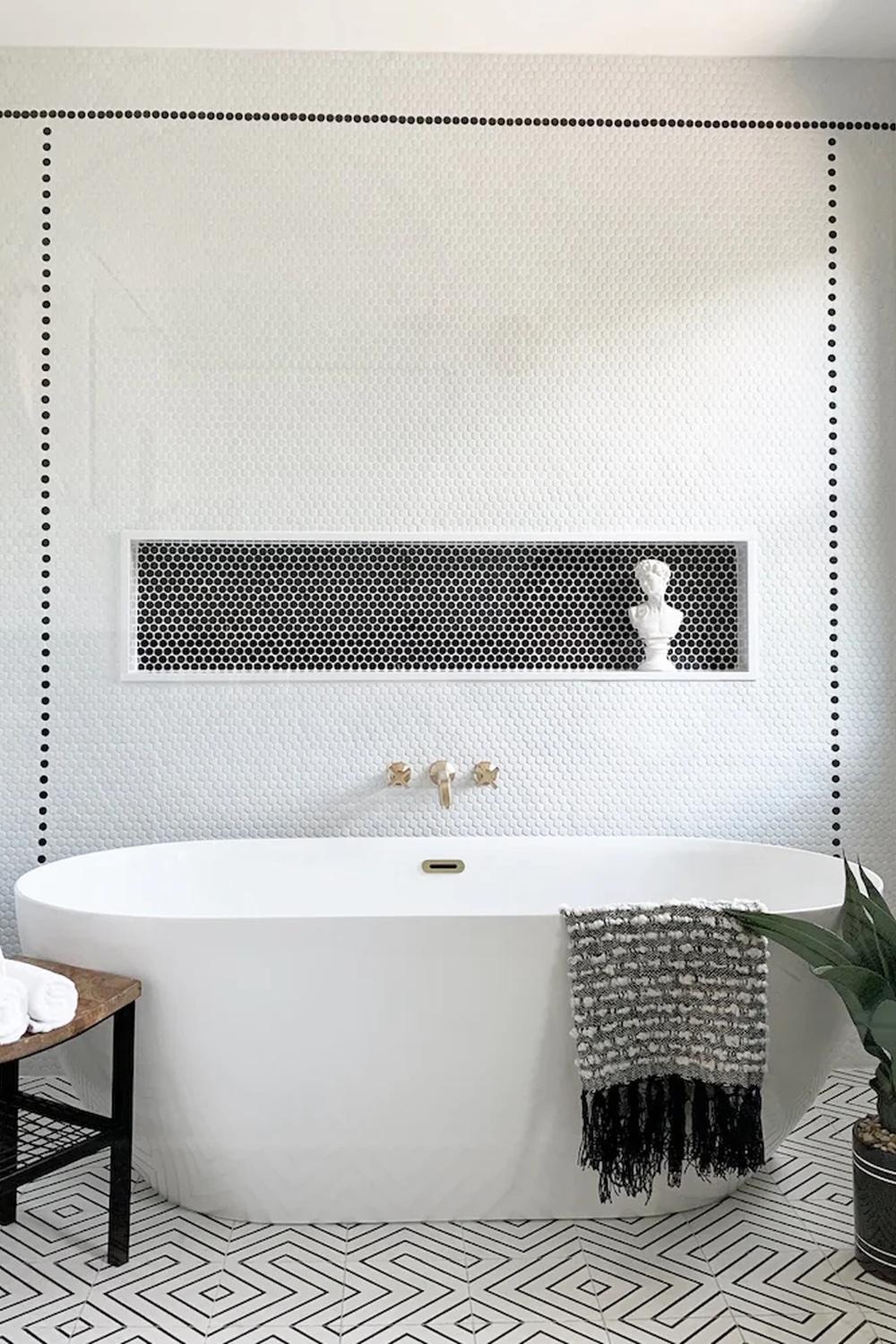 A harmonious bathroom combining elegance with geometric elements.