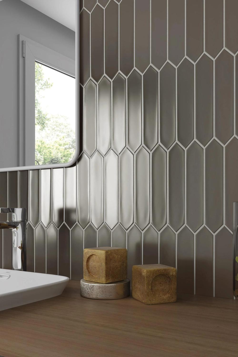 Modern bathroom showcasing a picket-shaped tile backsplash with sleek features, creating a minimalist and elegant environment.