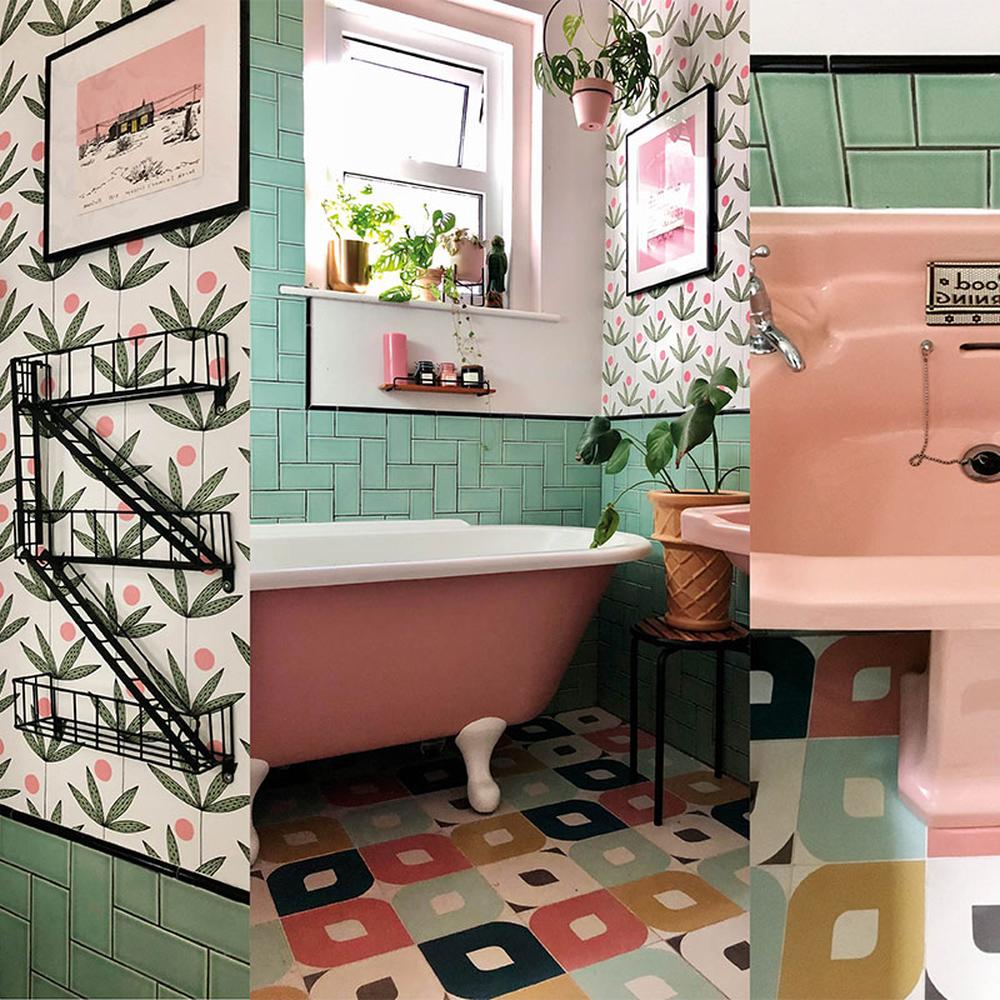 Vibrant bathroom with floral wallpaper and a classic pink bathtub