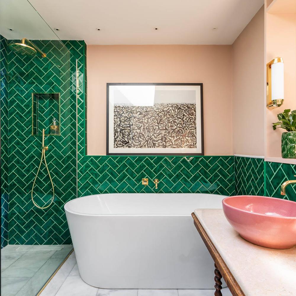 Contemporary bathroom with pink and green accents and elegant fixtures