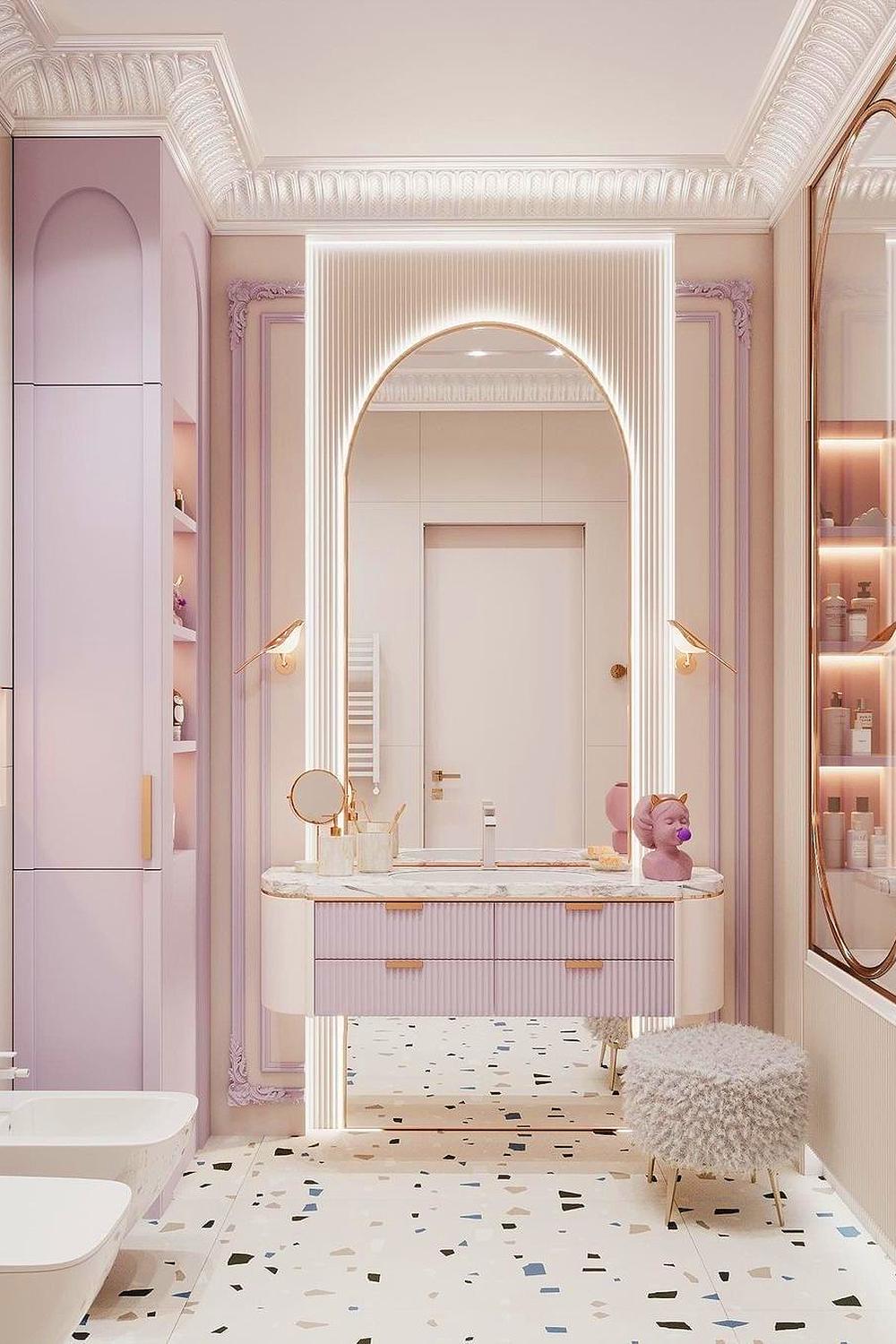A stylish pink bathroom featuring a modern vanity and cozy decor.