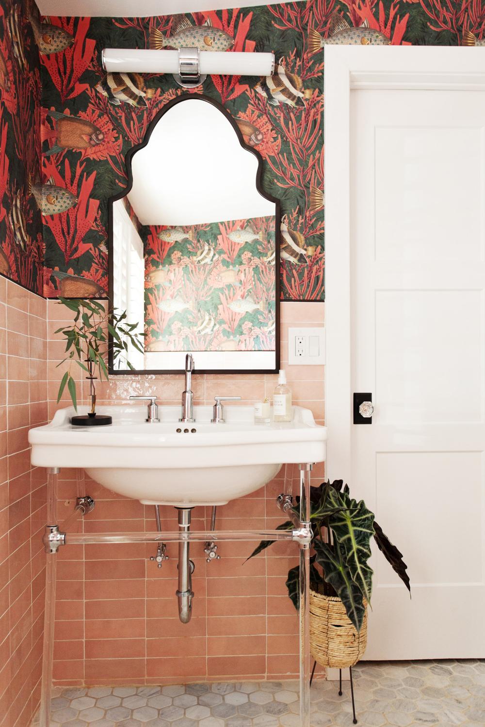 Stylish bathroom featuring vibrant coral and marine life wallpaper