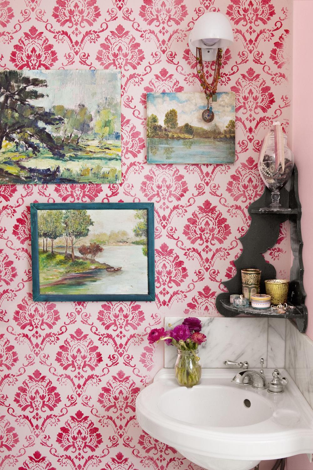 Stylish bathroom showcasing intricate damask pattern wallpaper