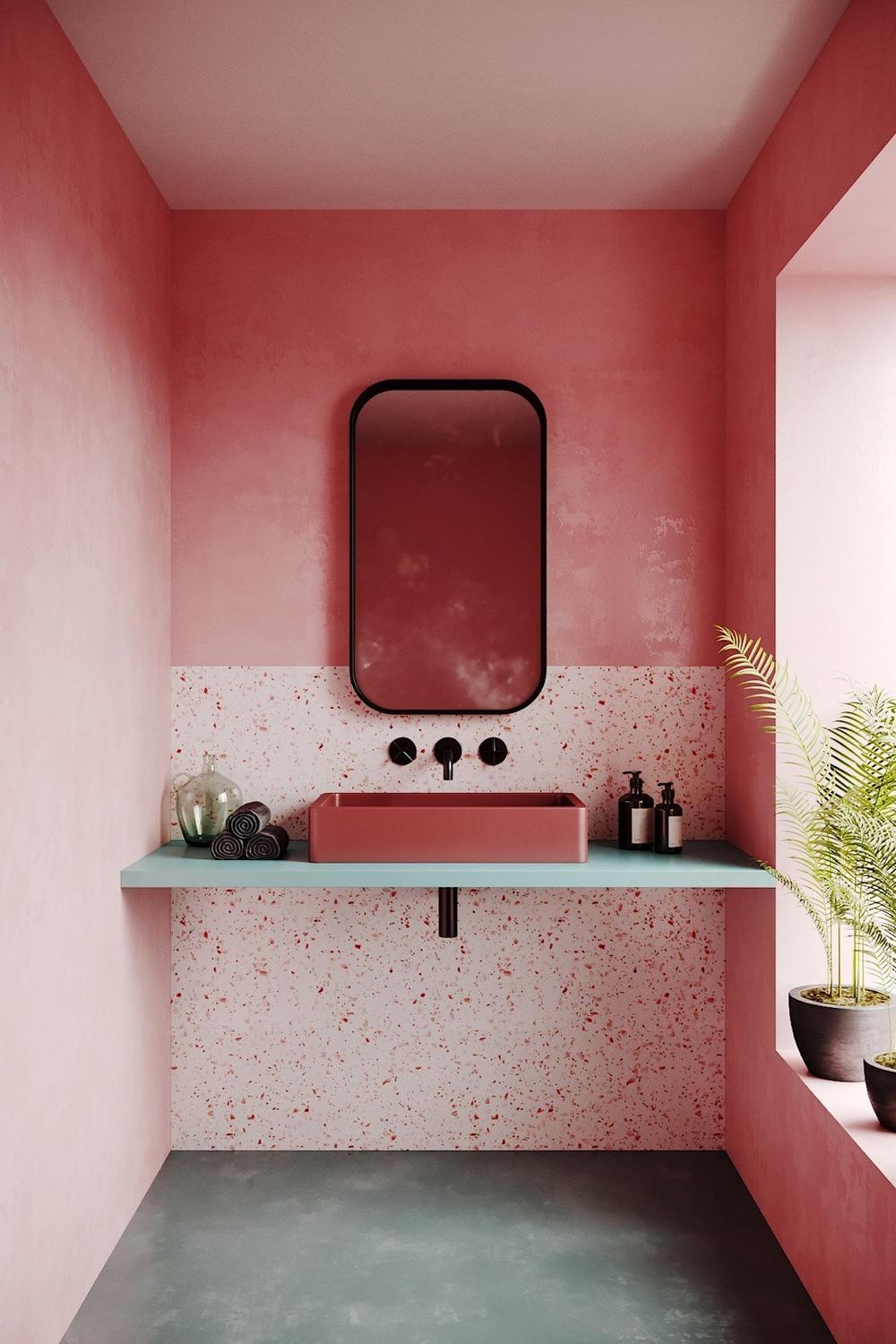 Refreshing modern bathroom with vibrant pink and turquoise accents.