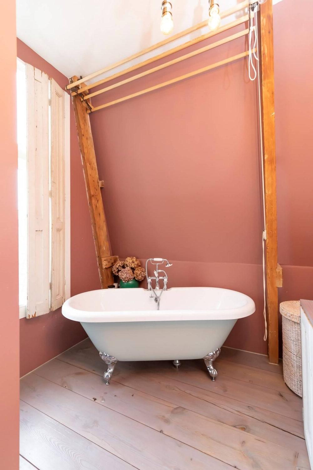 Elegant rustic bathroom with vintage decor and modern features.
