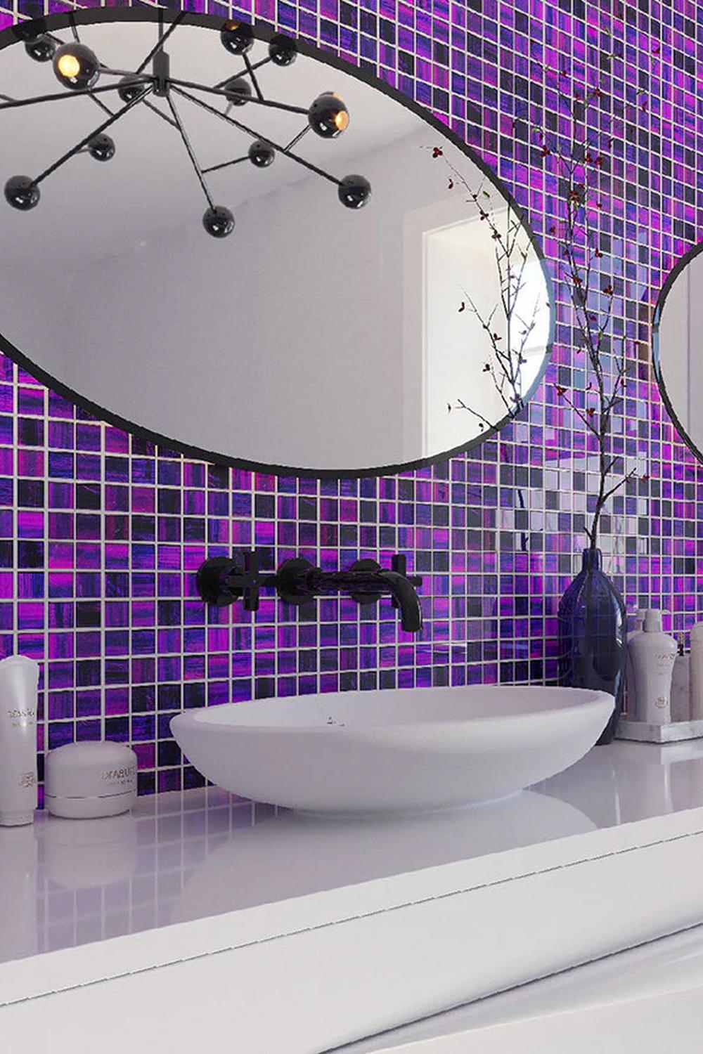 Modern bathroom featuring patterned purple tiles and elegant fixtures