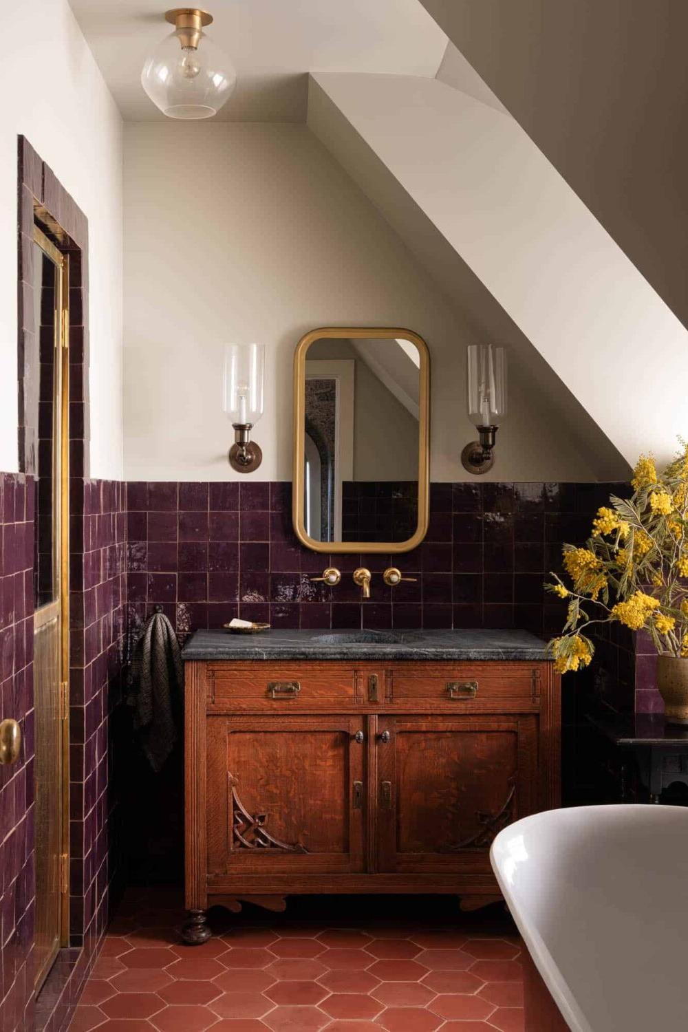 Stylish bathroom blending vintage and modern with purple aesthetics