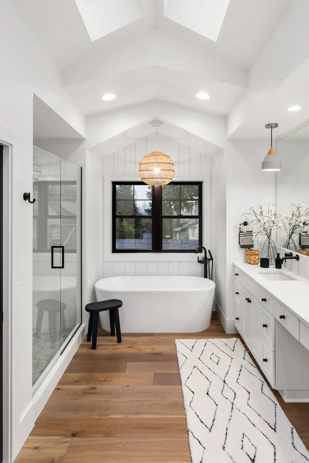 Modern open bathroom design with natural light and cozy features